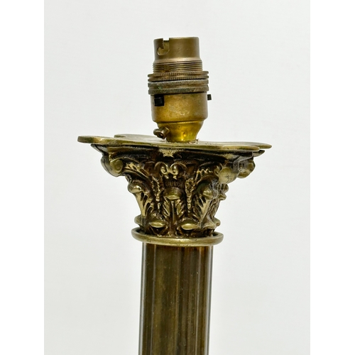 675 - A large Mid 20th Century brass table lamp with Corinthian style column. 17x17x52cm.