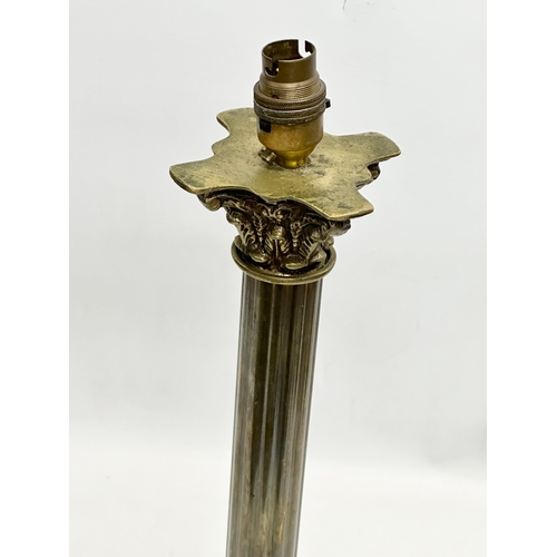 675 - A large Mid 20th Century brass table lamp with Corinthian style column. 17x17x52cm.