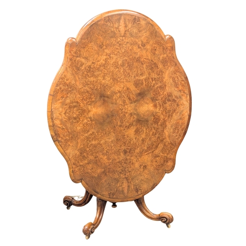 608 - A Victorian Burr Elm tilt top pedestal breakfast table / dining table on Cabriole legs. Circa 1860-1... 