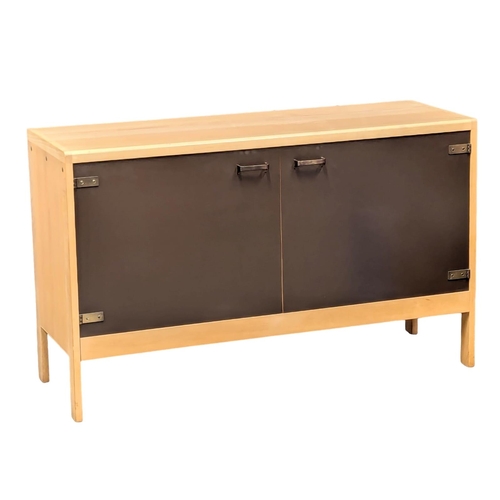 933 - A Mid Century style sideboard. 123.5x43x76cm (6)