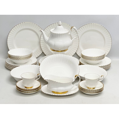 647 - Royal Albert “Val D’or” a 44 piece dinner and tea service. 8 dinner plates, gravy boat and saucer, s... 