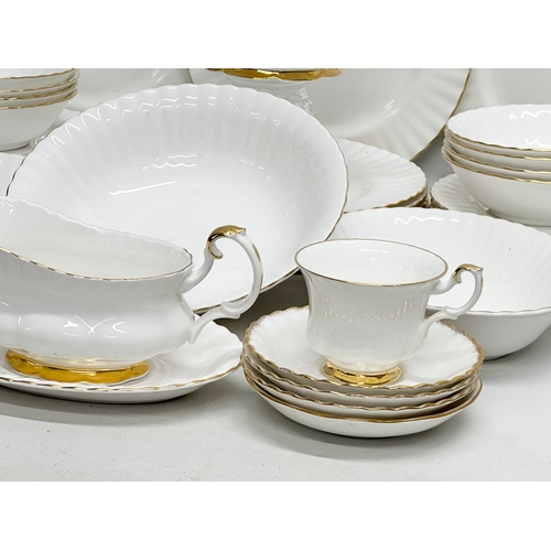 647 - Royal Albert “Val D’or” a 44 piece dinner and tea service. 8 dinner plates, gravy boat and saucer, s... 