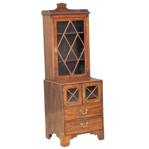 439 - A fine proportioned 19th Century Georgian style inlaid mahogany bookcase with astragal glazed doors,... 