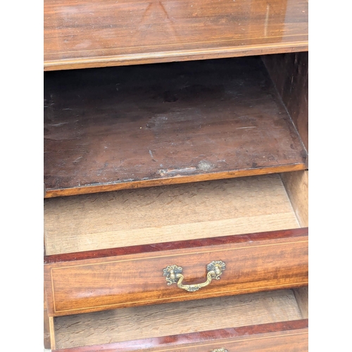 439 - A fine proportioned 19th Century Georgian style inlaid mahogany bookcase with astragal glazed doors,... 