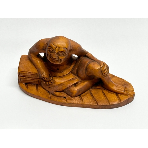 327 - 7 Japanese carved boxwood netsuke figures.