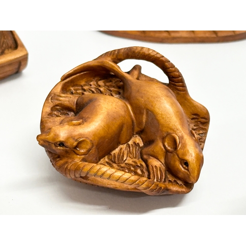 327 - 7 Japanese carved boxwood netsuke figures.