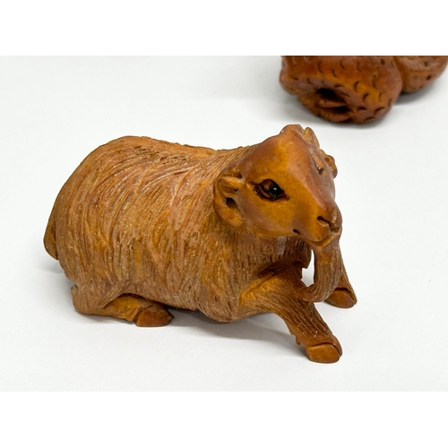 327 - 7 Japanese carved boxwood netsuke figures.