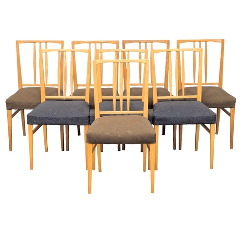 607 - A set of 8 Mid Century ash dining chairs by Gordon Russell. (7)