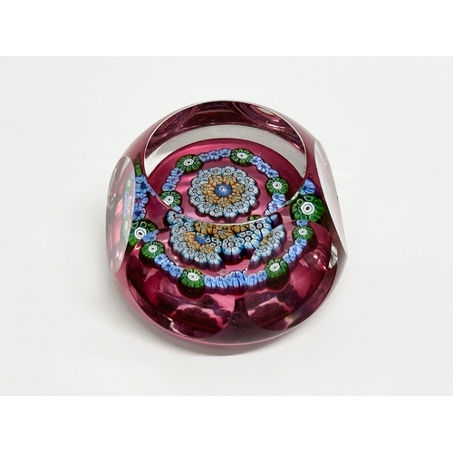 179 - A Perthshire millefiori glass paperweight.