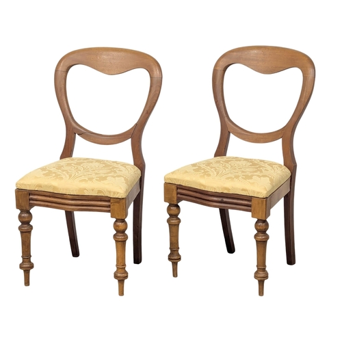 808 - A pair of Victorian mahogany balloon back chairs. 9