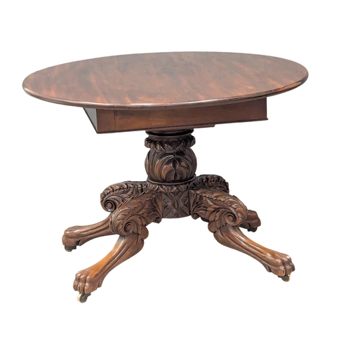 425 - A William IV mahogany breakfast table on lion paw feet. Circa 1830s. 99x71cm (9)