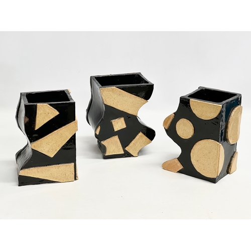 332 - A set of 3 Mid 20th Century glazed studio pottery abstract vases. 15x12x20cm.