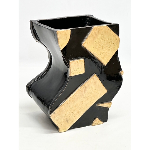 332 - A set of 3 Mid 20th Century glazed studio pottery abstract vases. 15x12x20cm.