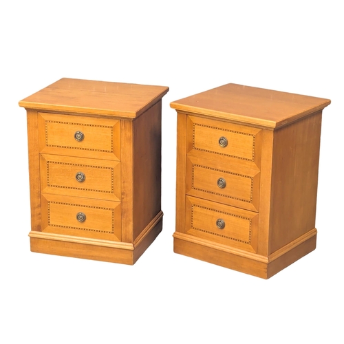 430 - A pair of inlaid bedside chests. 46x42x62cm (10)