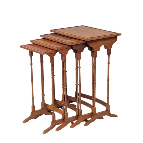 960 - A vintage Georgian style yew wood nest of tables. 50x35.5x72cm(10)