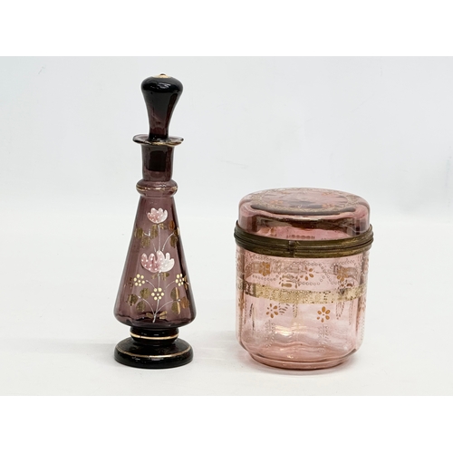 385 - Late 19th Century glassware. A small Late 19th Century Bohemian amethyst glass decanter, together wi... 