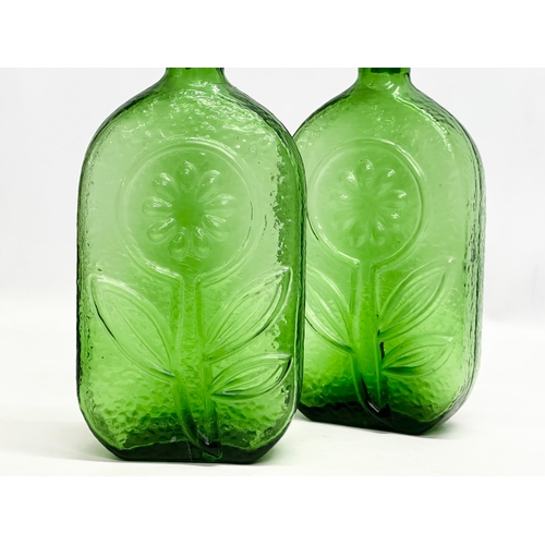 94 - Wayne Husted. A pair of large Stelvia Glass bottles with stoppers. Designed by Wayne Husted for Stel... 