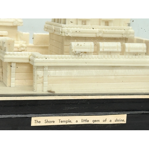 649 - A cased display of The Shore Temple. A little gem of a shrine. 20.5x15.5x21.5cm.