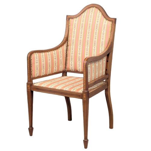 932 - An Early 20th Century Sheraton Revival inlaid mahogany armchair. Circa 1900-1910. 54x102cm (10)