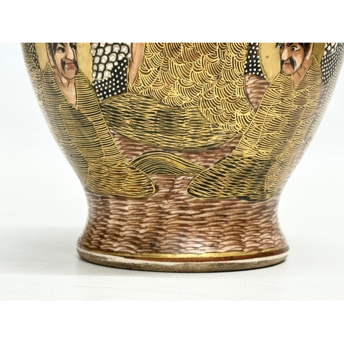 133 - A rare signed Japanese hand painted baluster vase. By Satsuma. Decorated with immortals, ribbons and... 