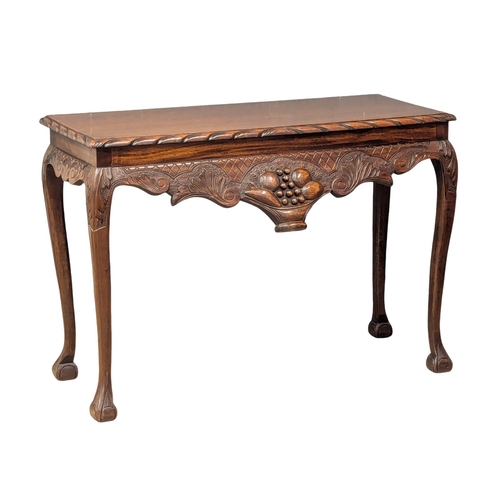 707 - An Irish Chippendale style mahogany side table. 107.5x44cm 75.5cm(1)