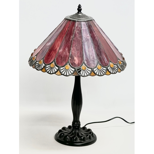 708 - A large Tiffany style table lamp. 38x57cm.