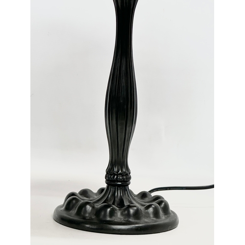 708 - A large Tiffany style table lamp. 38x57cm.