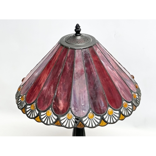 708 - A large Tiffany style table lamp. 38x57cm.