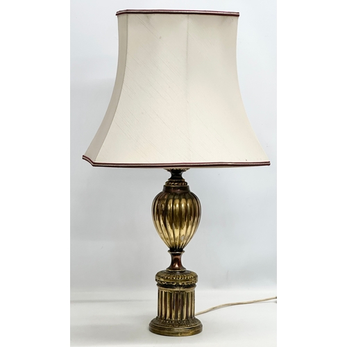 772 - A large Mid 20th Century brass table lamp. 81cm.