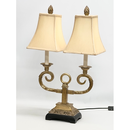 784 - A large French style gilt 2 branch table lamp. 43x70cm.