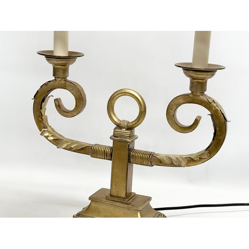 784 - A large French style gilt 2 branch table lamp. 43x70cm.