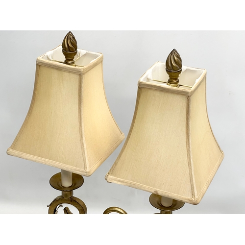 784 - A large French style gilt 2 branch table lamp. 43x70cm.