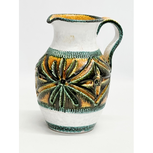 388 - Nuovo Rinascimento. A 1960’s Italian Mid Century majolica jug, by Nuovo Rinascimento. 16x14x21cm.