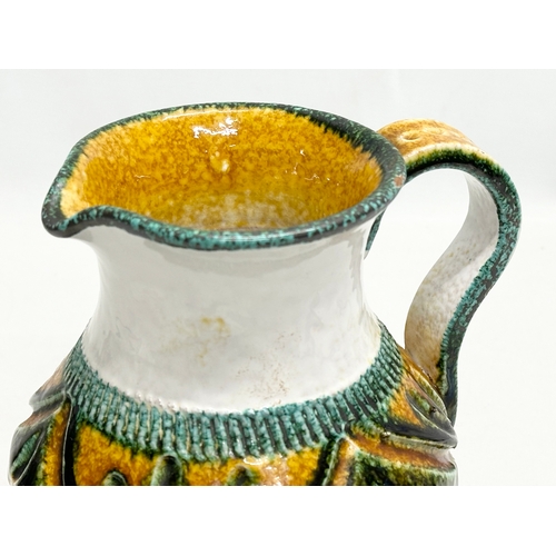 388 - Nuovo Rinascimento. A 1960’s Italian Mid Century majolica jug, by Nuovo Rinascimento. 16x14x21cm.