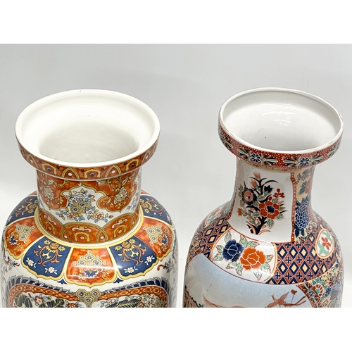 818 - Two large Chinese pottery vases. 45cm. 39cm.