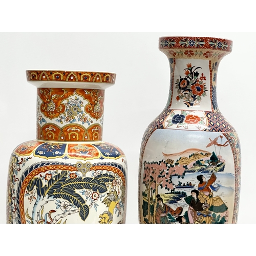 818 - Two large Chinese pottery vases. 45cm. 39cm.