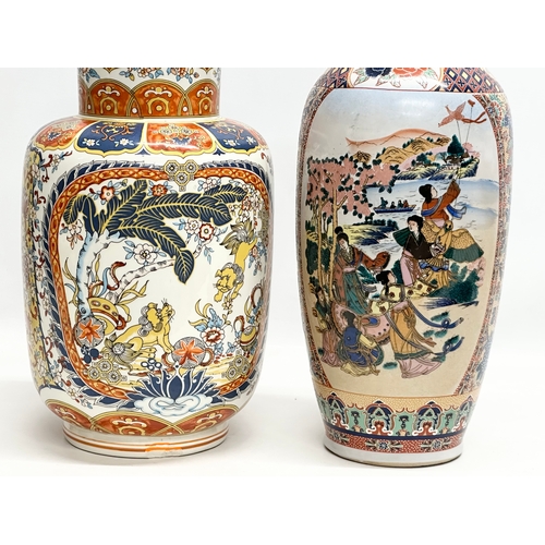 818 - Two large Chinese pottery vases. 45cm. 39cm.