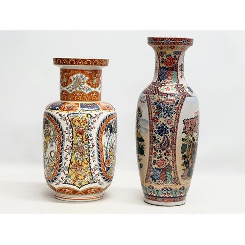 818 - Two large Chinese pottery vases. 45cm. 39cm.