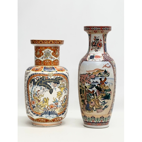 818 - Two large Chinese pottery vases. 45cm. 39cm.