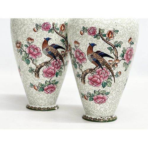 821 - A pair of Early 20th Century “Pheasant” vases by Frederick Winkle (F.Winkle & Co) Whieldom Ware. 14x... 