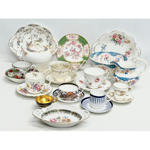 823 - A collection of 19th and 20th Century tea ware. Royal Crown Derby, Davenport, Aynsley, Dresden, Mint... 