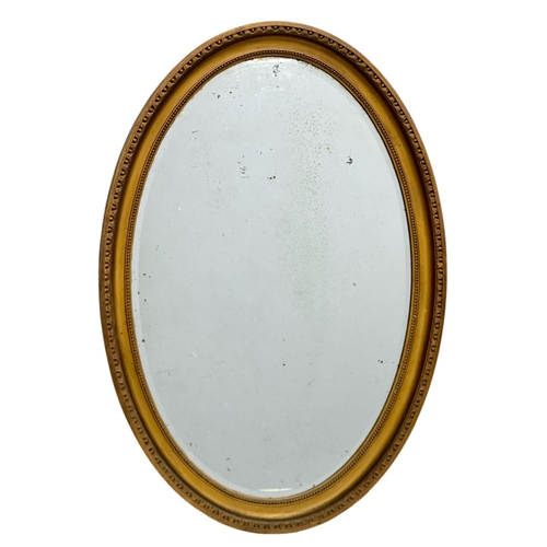 401 - A large Late 19th Century Victorian gilt framed mirror. 69x101cm.