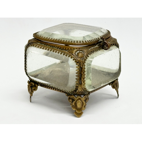 728 - A Late 19th Century pocket watch case, with gilt brass frame and 5 bevelled glass panels. 8x8x7cm.