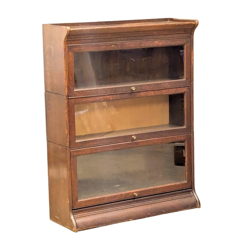 368 - An Early 20th Century oak stacking bookcase. Circa 1900-1910. 87x30x113.5cm(4)