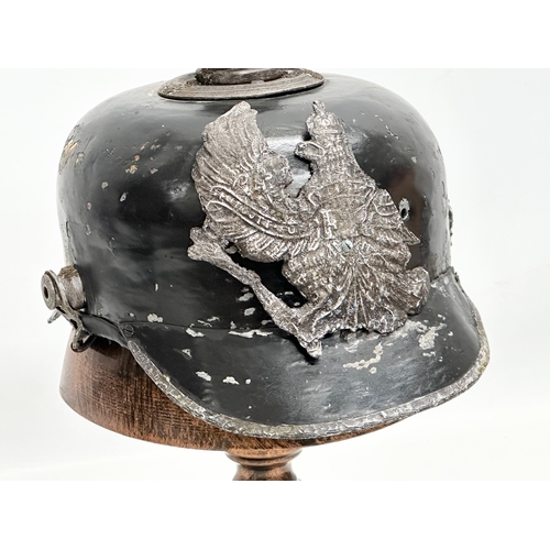 252 - A WWI German artillery pickelhaube helmet.