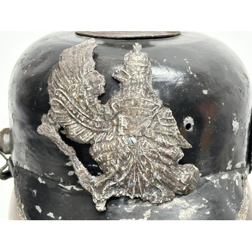 252 - A WWI German artillery pickelhaube helmet.