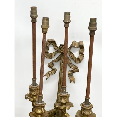 365 - A pair of large Mid 20th Century brass wall lights. 33x70cm