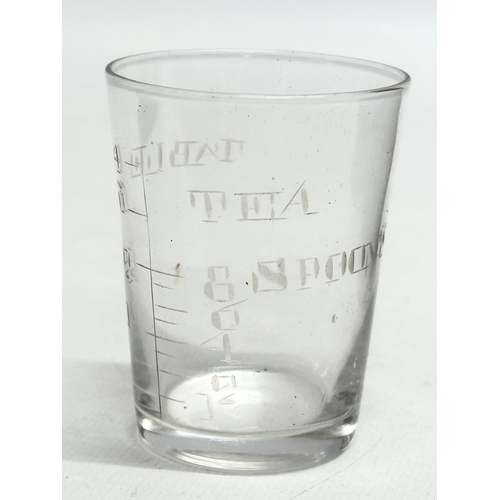 776 - Croyden Chemist. A Late 19th Century travelling medicine glass with original case.