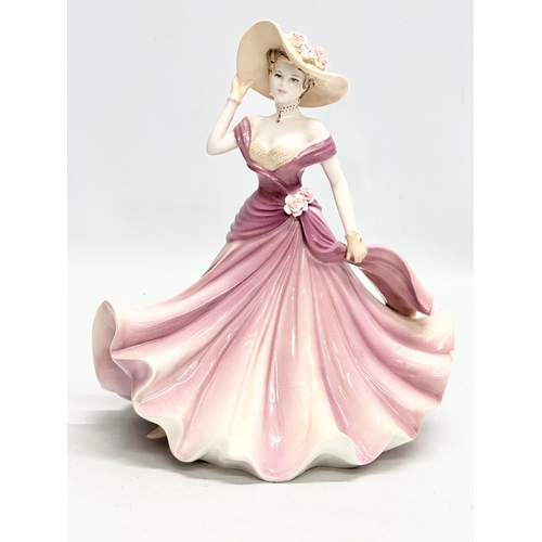 777 - A Coalport Ladies of Fashion “Helena” figurine. 20x25cm.