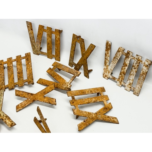 780 - A quantity of Late 19th/Early 20th Century cast iron Roman numerals. 23cm